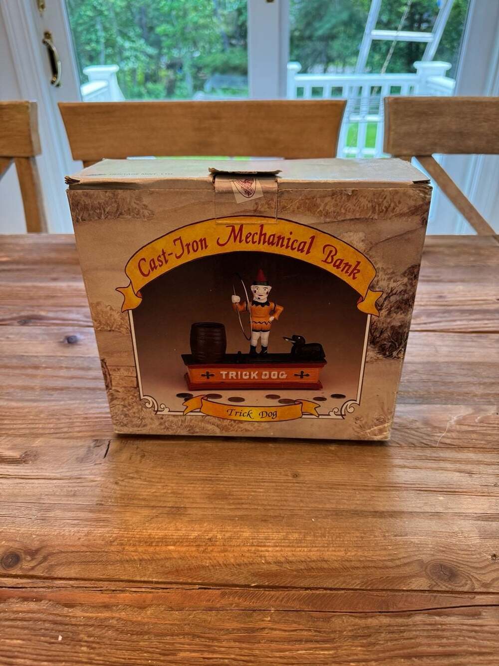 Antique mechanical bank circus clown and dog